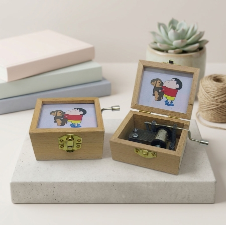 Shin Chan with shiro music box