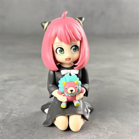 SPY x FAMILY - Anya Forger ( her sitting down and holding a colorful plush )  action figure  10 cm